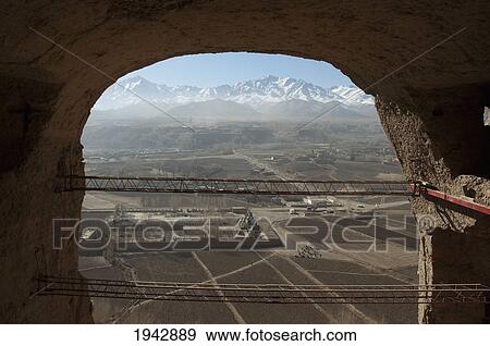 Large Scaffolding For The Emergency Consolidation Of The Niche Of The Small Buddha, Destroyed By The Taliban In 2001 In Bamiyan, Bamian Province, Afghanistan View Large Photo Image Stock Photo - Large Scaffolding For The Emergency Consolidation Of The Niche Of The Small Buddha, Destroyed By The Taliban In 2001 In Bamiyan, Bamian Province, Afghanistan. Fotosearch