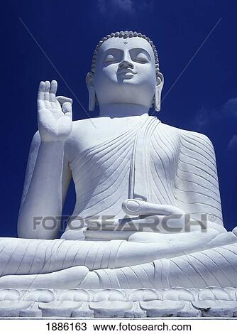 Stock Image - Large Seated White Buddha. Fotosearch