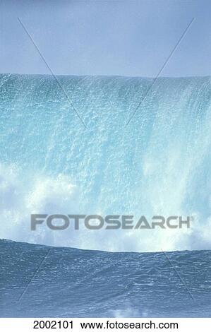Large Turquoise With Whitewash Wave, Curling Over Into Gray Water, Pale Blue Sky View Large Photo Image Stock Image - Large Turquoise With Whitewash Wave, Curling Over Into Gray Water, Pale Blue Sky. Fotosearch