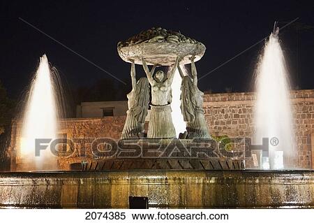 Stock Photography - Las Tarascas Fountain At Night, Morelia, Michoac. Fotosearch