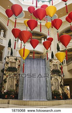 Las Vegas, Nevada, United States Of America; Waterfalls And Hanging Ornaments In The Interior Hotel Courtyard View Large Photo Image Stock Photo - Las Vegas, Nevada, United States Of America; Waterfalls And Hanging Ornaments In The Interior Hotel Courtyard. Fotosearch
