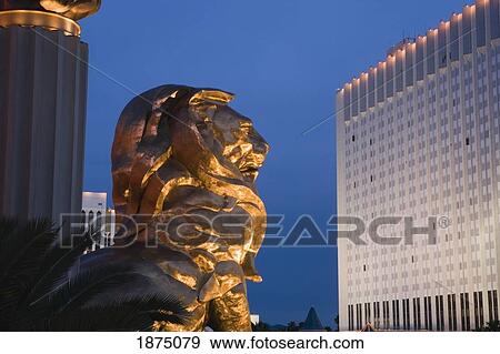 Stock Photo - Las Vegas, Nevada, United States Of America; A Lion Statue Illuminated At Night. Fotosearch
