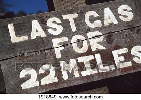Stock Photo - Last Gas For 22 Miles Sign. Fotosearch