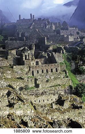 Stock Photo - Late Afternoon Sun On Machu Picchu, Aerial View. Fotosearch