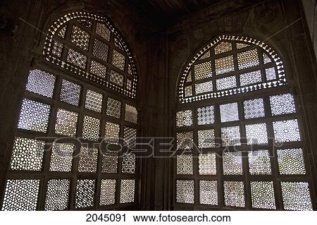 Stock Image - Latticed Windows At The Tomb Of Mohammed Gaus, Gwalior, Madhya Pradesh, India. Fotosearch