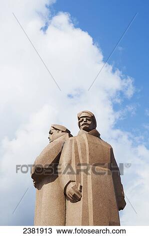 Stock Image - Latvian Riflemen Monument in Old Town of Riga; Riga, Latvia. Fotosearch
