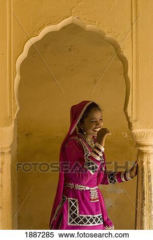 Laughing Woman In Traditional Rajasthani Sari And Jewellery In Archway Of Old Building View Large Photo Image Stock Photography - Laughing Woman In Traditional Rajasthani Sari And Jewellery In Archway Of Old Building. Fotosearch