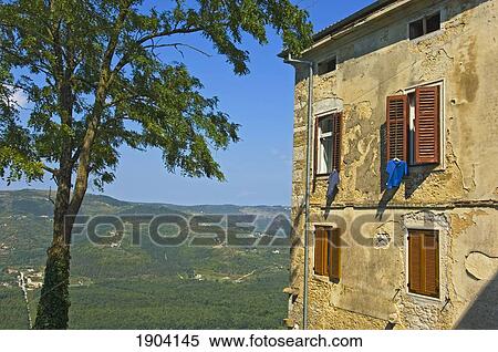 Laundry Hanging From Shutters In Motovun, Istria, Croatia View Large Photo Image Stock Photography - Laundry Hanging From Shutters In Motovun, Istria, Croatia. Fotosearch