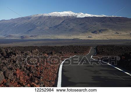 Lava fields of Mauna Loa, Mauna Loa Strip Road (Stainback Road), snowcapped Mauna Kea; Island of Hawaii, Hawaii, United States of America View Large Photo Image Picture - Lava fields of Mauna Loa, Mauna Loa Strip Road (Stainback Road), snowcapped Mauna Kea; Island of Hawaii, Hawaii, United States of America. Fotosearch