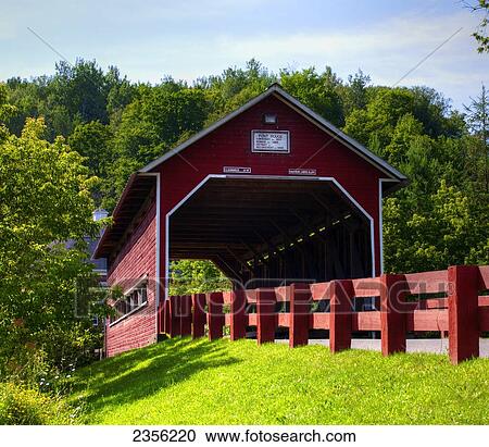 Stock Image - Le Pont Rouge, A Red Covered Bridge, Original Construction 1887; Coaticook, Quebec, Canada. Fotosearch