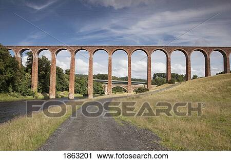 Stock Image - Leaderfoot Viaduct Over A Road, Scottish Borders, Scotland. Fotosearch