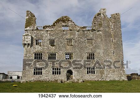 Stock Photo - Leamaneh Castle In The Burren Region; County Clare Ireland. Fotosearch