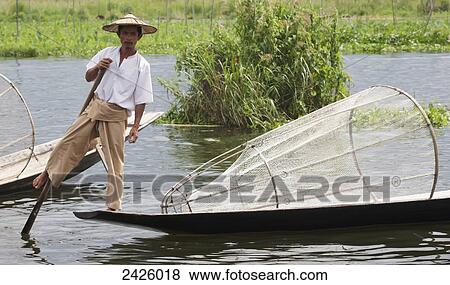 Leg rower fisherman on Inle Lake; Myanmar View Large Photo Image Stock Photo - Leg rower fisherman on Inle Lake; Myanmar. Fotosearch
