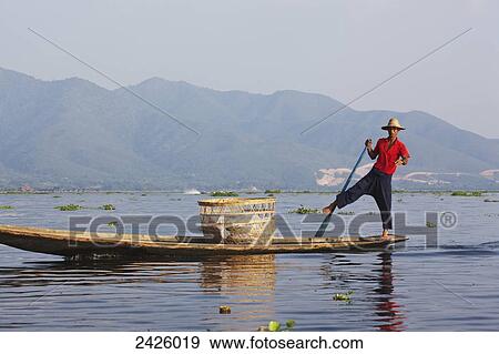 Leg rower fisherman on Inle Lake; Myanmar View Large Photo Image Stock Photo - Leg rower fisherman on Inle Lake; Myanmar. Fotosearch