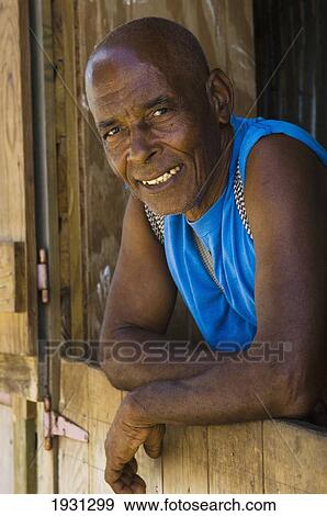 Stock Photo - Legendary Grenadian hiker and guide known locally as the 'Indiana Jones of Grenada', Telfor Bedeau. Legendary Grenadian hiker and guide known locally as the 'Indiana Jones of Grenada'. Grenada. Caribbean. PHOTO. Fotosearch