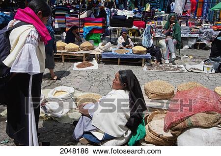 Stock Photograph - Legume Vendors At The Saturday Market, Otavalo, Imbabura, Ecuador. Fotosearch