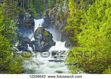 Liberty Falls rushing down among fresh green foliage at Liberty Falls State Campground near Chitina, Southcentral Alaska, Summer View Large Photo Image Stock Image - Liberty Falls rushing down among fresh green foliage at Liberty Falls State Campground near Chitina, Southcentral Alaska, Summer. Fotosearch