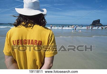Stock Image - Lifeguard, Cornish Beach, Uk.. Fotosearch