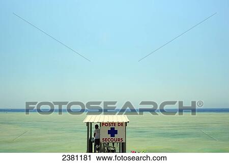 Lifeguard hut against a blue sky and sea; Nice, France View Large Photo Image Stock Image - Lifeguard hut against a blue sky and sea; Nice, France. Fotosearch