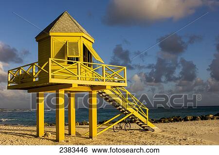 Stock Photograph - Lifeguard tower at sunset; Bridgetown, Barbados. Fotosearch