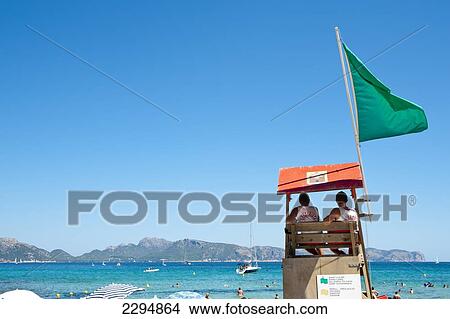 Picture - Lifeguards In Cala Sant Pere, Alcudia, Mallorca, Balearic Islands, Spain. Fotosearch