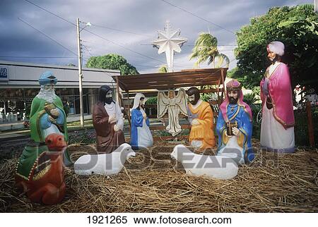 Stock Photography - Lifesize, Illuminated Nativity Scene. Fotosearch