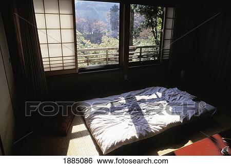 Stock Photograph - Light Shining On Futon In Traditional Japanese Interior. Fotosearch