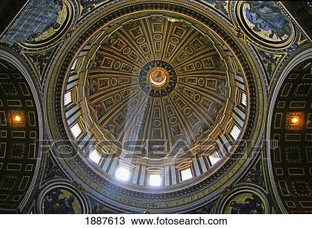 Stock Image - Light Shining Through Windows In The Dome Of St Peter's. Fotosearch