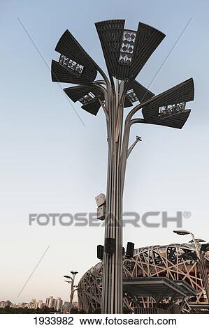 Stock Image - Light Standard Outside The Bird's Nest Stadium Built For 2008 Summer Olympics; Beijing, China. Fotosearch