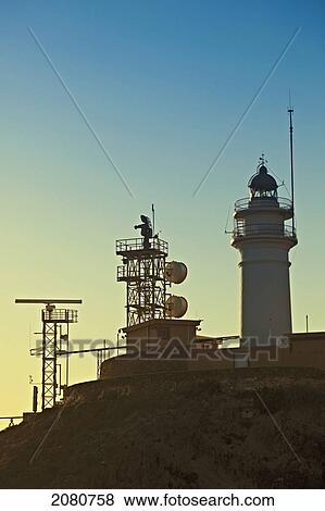 Stock Photo - Lighthouse And Communications Apparatus On The Headland In The Cabo De Gata-Nijar Natural Park; Cabo De Gata Almeria Province Spain. Fotosearch