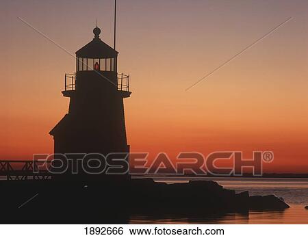 Stock Photograph - Lighthouse At Sunrise. Fotosearch