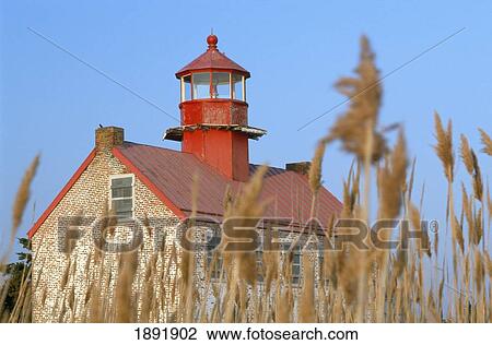 Stock Image - Lighthouse In Wheat Field. Fotosearch