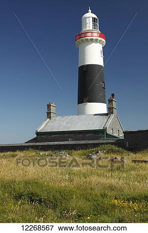 Lighthouse on Inisheer island, smallest of the Aran islands, off the Galway coast on the Wild Atlantic Way; County Galway, Ireland View Large Photo Image Stock Photo - Lighthouse on Inisheer island, smallest of the Aran islands, off the Galway coast on the Wild Atlantic Way; County Galway, Ireland. Fotosearch