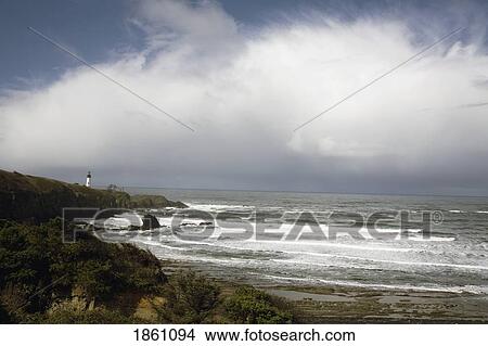 Picture - Lighthouse Seen In The Background Of Seascape. Fotosearch