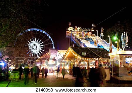 Stock Photo - Lights From The Fun Fair At Winter Wonderland In Hyde Park, London, Uk. Fotosearch