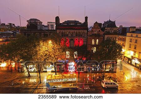 Lights Illuminate Buildings In Temple District At Dusk; Dublin, Ireland View Large Photo Image Stock Photo - Lights Illuminate Buildings In Temple District At Dusk; Dublin, Ireland. Fotosearch