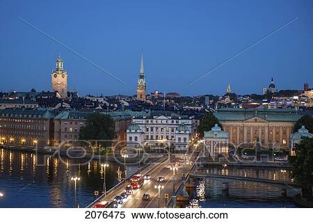 Lights Illuminating The City And Road At Dusk; Stockholm Sweden View Large Photo Image Stock Photography - Lights Illuminating The City And Road At Dusk; Stockholm Sweden. Fotosearch