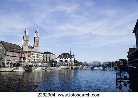Limmat River and Grossmunster church in the distance; Zurich city, Zurich, Switzerland View Large Photo Image Picture - Limmat River and Grossmunster church in the distance; Zurich city, Zurich, Switzerland. Fotosearch