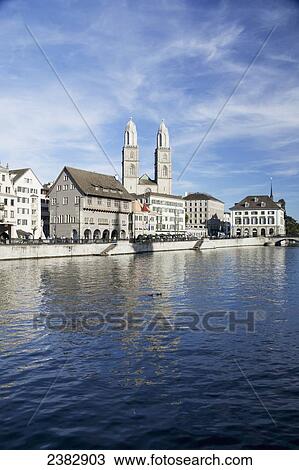 Limmat River and Grossmunster church in the distance; Zurich city, Zurich, Switzerland View Large Photo Image Stock Image - Limmat River and Grossmunster church in the distance; Zurich city, Zurich, Switzerland. Fotosearch