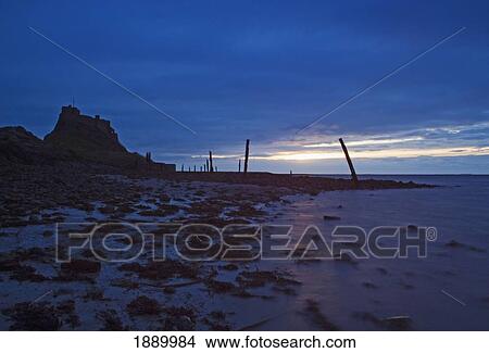 Lindisfarne Castle On Holy Island At Dusk. View Large Photo Image Picture - Lindisfarne Castle On Holy Island At Dusk.. Fotosearch