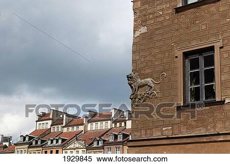 Stock Photography - Lion motif on a wall of a late-Renaissance style burgher house near the market square of the UNESCO World Heritage Site Old Town district of Warsaw, Poland. Fotosearch