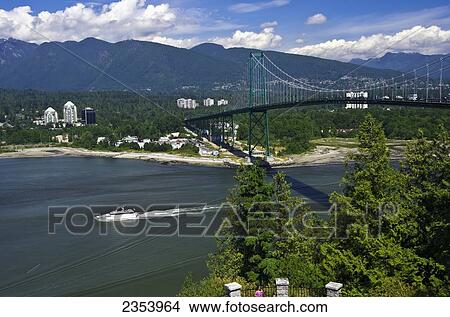 Picture - Lions Gate Bridge Crosses Burrard Inlet To West Vancouver From Stanley Park; Vancouver, British Columbia, Canada. Fotosearch