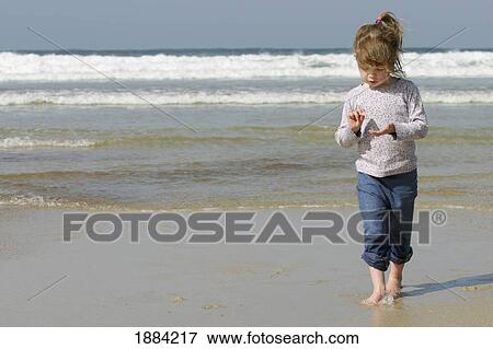 Little Girl On Sennen Cove Beach View Large Photo Image Stock Photo - Little Girl On Sennen Cove Beach. Fotosearch