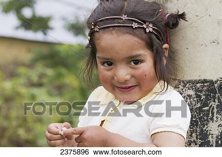 Stock Photograph - Little girl, San Bartolo, Amazonas, Peru. Fotosearch