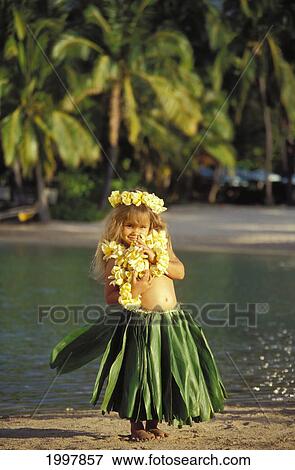Little Hula Girl On Beach, Grass Skirt, Yellow Lei And Haku, Palm Tree Background, Water View Large Photo Image Stock Photo - Little Hula Girl On Beach, Grass Skirt, Yellow Lei And Haku, Palm Tree Background, Water. Fotosearch