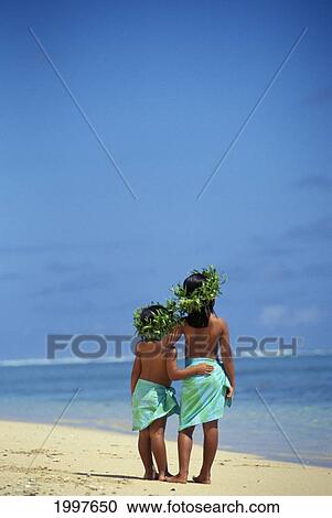 Little Polynesian Sisters In Haku And Pareo On Beach Face Water, View From Behind View Large Photo Image Stock Image - Little Polynesian Sisters In Haku And Pareo On Beach Face Water, View From Behind. Fotosearch