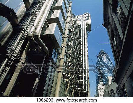 Stock Image - Lloyds Building And The Swiss Re Building. Fotosearch
