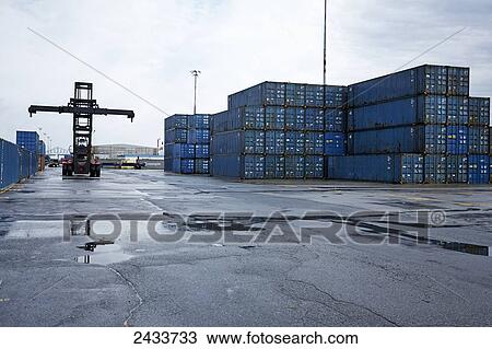 Loader and freight at Bickerdike Pier in Old Montreal; Montreal, Quebec, Canada View Large Photo Image Stock Image - Loader and freight at Bickerdike Pier in Old Montreal; Montreal, Quebec, Canada. Fotosearch