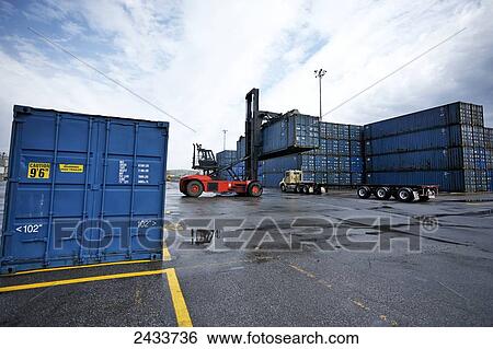 Loader and freight at Bickerdike Pier in Old Montreal; Montreal, Quebec, Canada View Large Photo Image Stock Photograph - Loader and freight at Bickerdike Pier in Old Montreal; Montreal, Quebec, Canada. Fotosearch