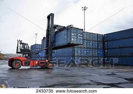 Loader and freight at Bickerdike Pier in Old Montreal; Montreal, Quebec, Canada View Large Photo Image Stock Photography - Loader and freight at Bickerdike Pier in Old Montreal; Montreal, Quebec, Canada. Fotosearch